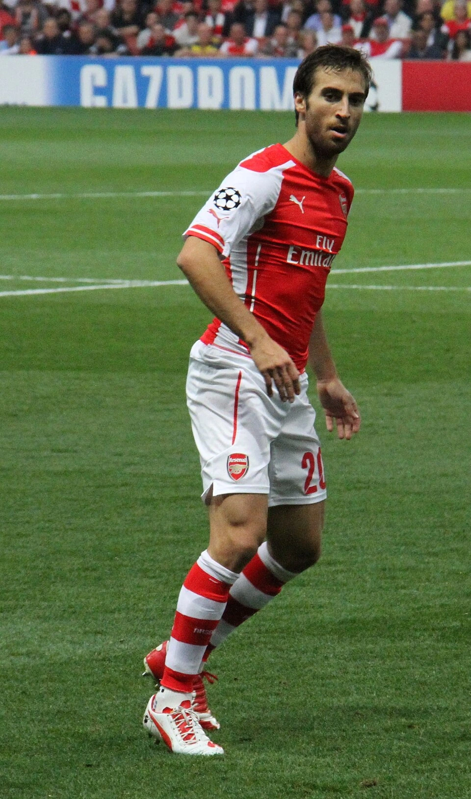 Mathieu Flamini in an Arsenal kit during a football match.